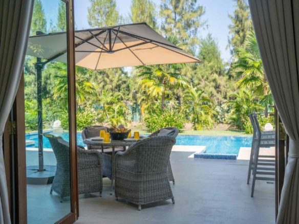 Truly Beautiful Luxury Pool Villa for Sale single-level Resort Home features Beautiful Lotus Pond located in Saraphi Chiang Mai